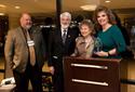 Renata Byler accepts the Family Hall of Fame Award for Denver Roller Family
