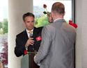 Jeff Smith passes out roses during the annual memorial service